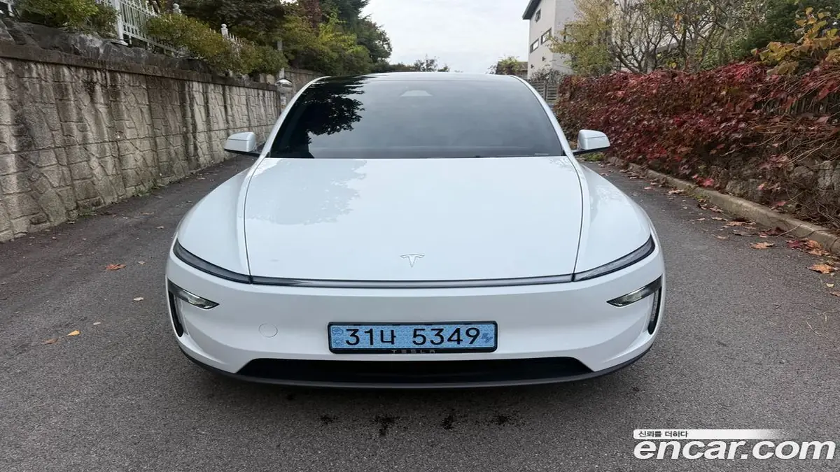 Tesla Model Y 2025 фото 2
